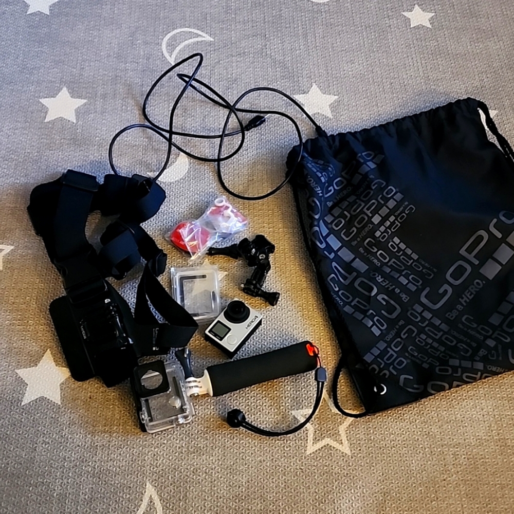 GoPro Hero4 & accessories.. backpack, chest strap vest, waterproof case